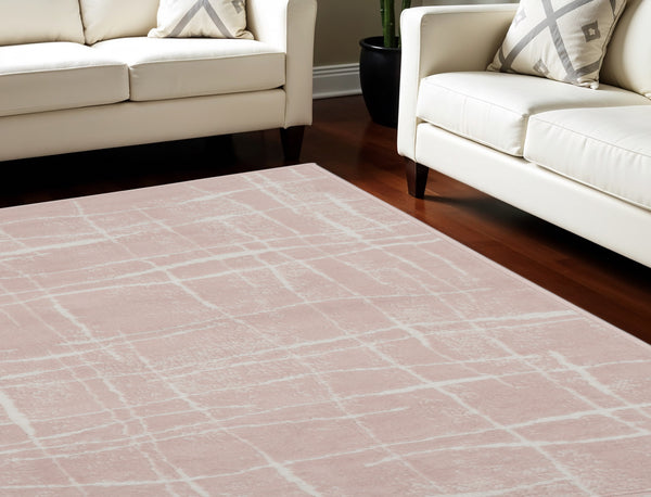 Homeroots 6' X 9' Pink And Ivory Abstract Distressed Non Skid Area Rug  Polypropylene 550714