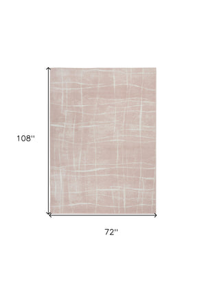 Homeroots 6' X 9' Pink And Ivory Abstract Distressed Non Skid Area Rug  Polypropylene 550714