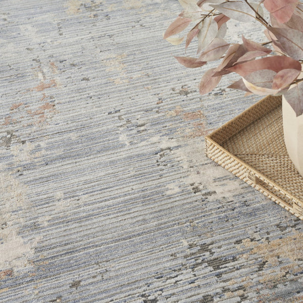 HomeRoots 8' Slate Blue Abstract Area Rug with Fringe - Modern Artistry, Durable Design, Perfect for Any Room 8' X 10' 550719