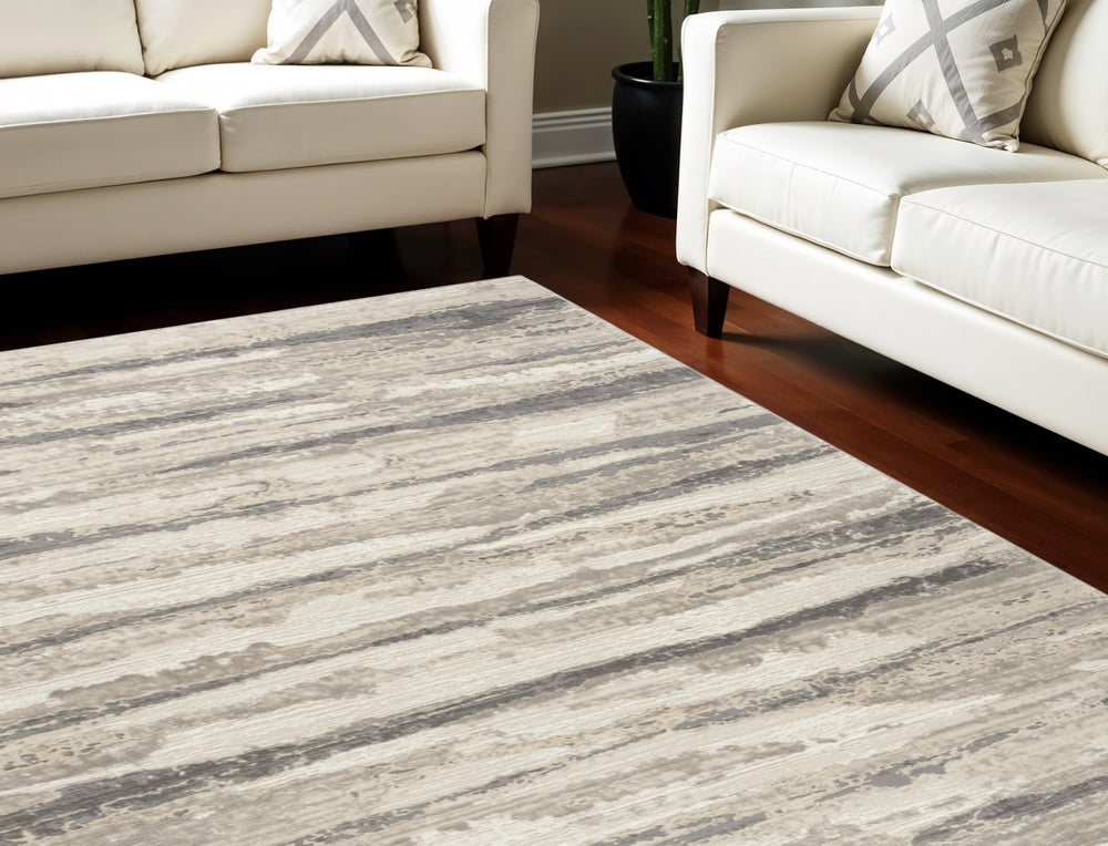 Homeroots 6' X 9' Ivory Black And Gray Abstract Non Skid Area Rug  Polyester 550727