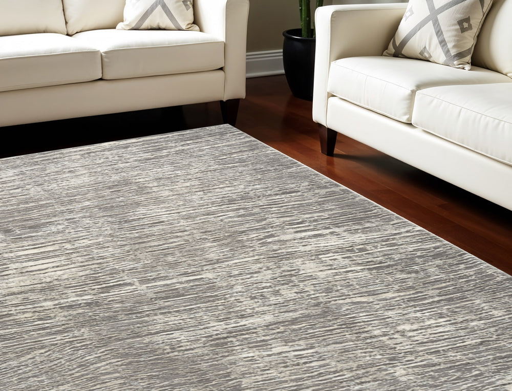 Homeroots 6' X 9' Ivory And Gray Abstract Non Skid Area Rug  Polyester 550728