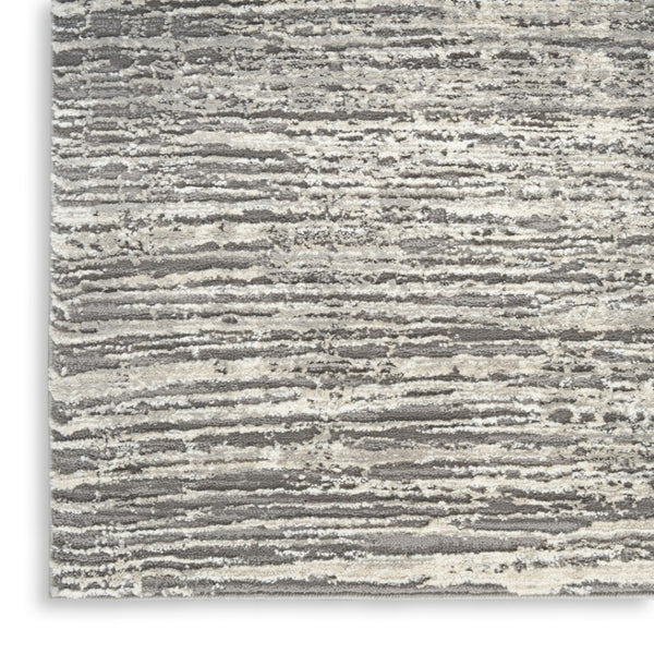 HomeRoots 5' Abstract Ivory and Gray Non-Skid Area Rug - Soft, Stain-Resistant, Durable for High-Traffic Spaces 6' X 9' 550728