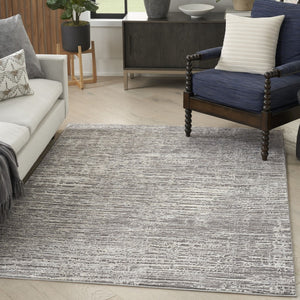 HomeRoots 5' Abstract Ivory and Gray Non-Skid Area Rug - Soft, Stain-Resistant, Durable for High-Traffic Spaces 6' X 9' 550728