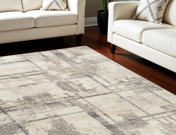 HomeRoots 5' Modern Abstract Area Rug in Ivory, Gray & Black - Durable, Stain-Resistant, Non-Skid Design 6' X 9' 550730