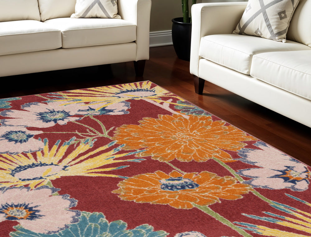 Homeroots 8' X 10' Orange And Red Tropical Floral Power Loom Area Rug  Polypropylene 550746