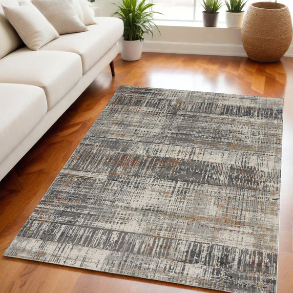 Homeroots 5' X 7' Ivory Gray And Golden Brown Abstract Area Rug  Polypropylene,Polyester 550791
