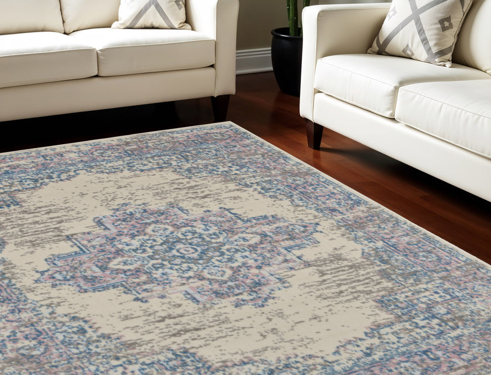 Homeroots 9' X 12' Ivory And Blue Floral Medallion Distressed Non Skid Area Rug  Polypropylene 550814