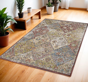 Homeroots 4' X 6' Green And Ivory Floral Distressed Area Rug  Polypropylene 550829