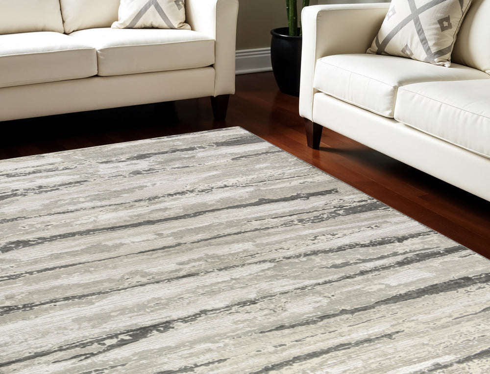 Homeroots 8' X 10' Ivory Black And Gray Abstract Non Skid Area Rug  Polyester 550833