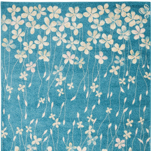 Homeroots 5' X 7' Turquoise And Cream Floral Area Rug - Durable, Stain-resistant, Perfect For Kids & Pets!  Polypropylene 550853