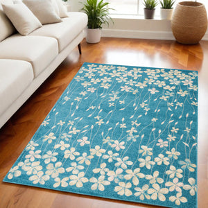 Homeroots 5' X 7' Turquoise And Cream Floral Area Rug - Durable, Stain-resistant, Perfect For Kids & Pets!  Polypropylene 550853
