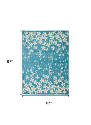 Homeroots 5' X 7' Turquoise And Cream Floral Area Rug - Durable, Stain-resistant, Perfect For Kids & Pets!  Polypropylene 550853