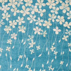 Homeroots 5' X 7' Turquoise And Cream Floral Area Rug - Durable, Stain-resistant, Perfect For Kids & Pets!  Polypropylene 550853