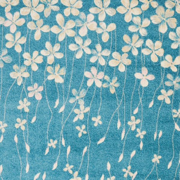 Homeroots 5' X 7' Turquoise And Cream Floral Area Rug - Durable, Stain-resistant, Perfect For Kids & Pets!  Polypropylene 550853