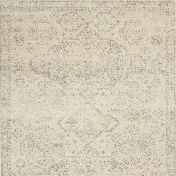 Homeroots 6' X 9' Beige And Gray Geometric Distressed Area Rug - Durable, Stain Resistant For Stylish Homes!  Polypropylene 550857