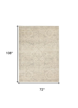 Homeroots 6' X 9' Beige And Gray Geometric Distressed Area Rug - Durable, Stain Resistant For Stylish Homes!  Polypropylene 550857
