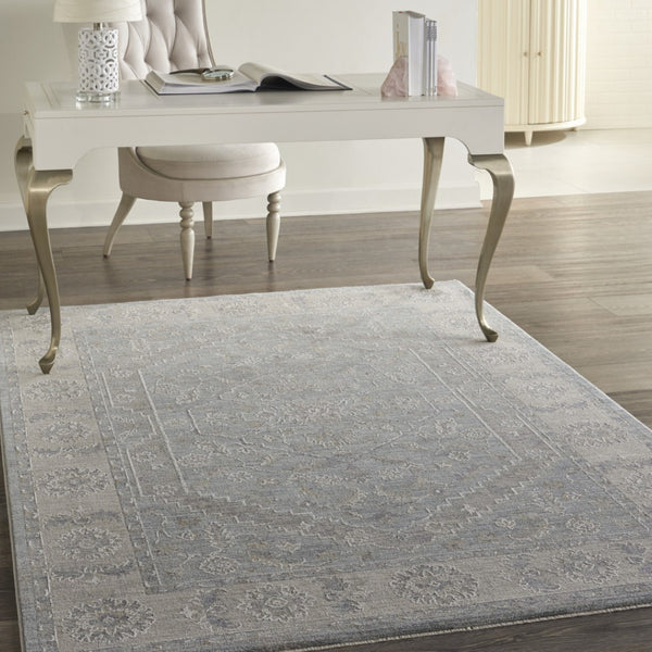 HomeRoots 5' Elegant Beige and Blue Floral Power Loom Area Rug for Sophisticated Living Room Decor 5' X 8' 550870