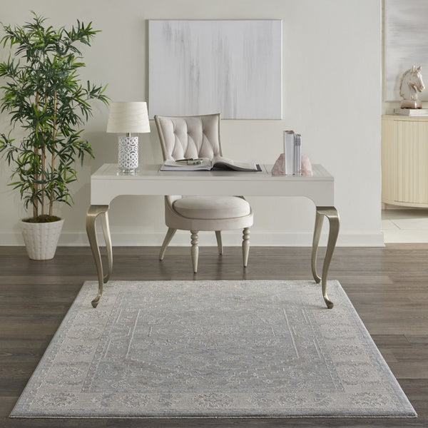HomeRoots 5' Elegant Beige and Blue Floral Power Loom Area Rug for Sophisticated Living Room Decor 5' X 8' 550870
