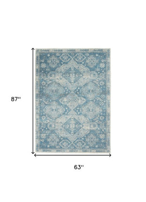 Homeroots 5' Ivory And Light Blue Medallion Distressed Area Rug - Durable, Stain Resistant, Stylish Design 5' X 7' Polypropylene 550871