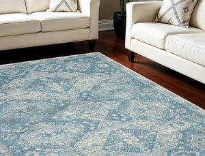 Homeroots 5' Ivory And Light Blue Medallion Distressed Area Rug - Durable, Stain Resistant, Stylish Design 6' X 9' Polypropylene 550872