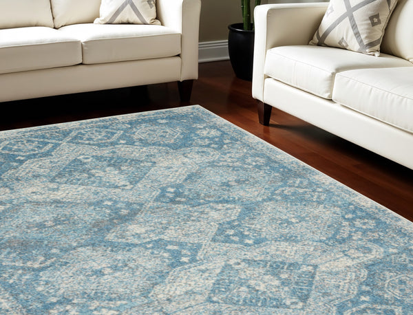 Homeroots 5' Ivory And Light Blue Medallion Distressed Area Rug - Durable, Stain Resistant, Stylish Design 6' X 9' Polypropylene 550872