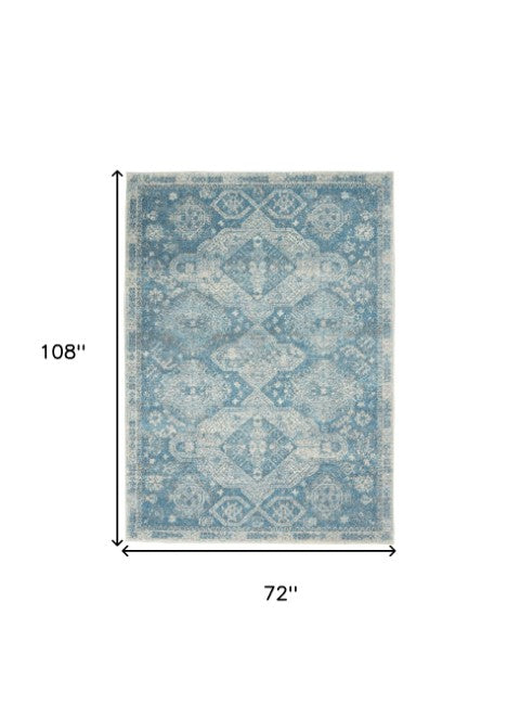 Homeroots 5' Ivory And Light Blue Medallion Distressed Area Rug - Durable, Stain Resistant, Stylish Design 6' X 9' Polypropylene 550872