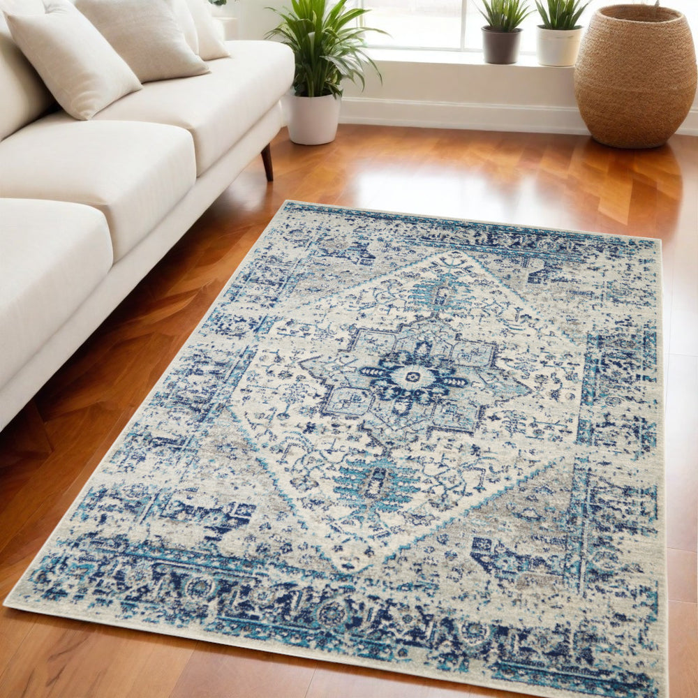 Homeroots 5' X 7' Distressed Floral Medallion Area Rug In Ivory And Light Blue – Durable, Stain-resistant Charm  Polypropylene 550895