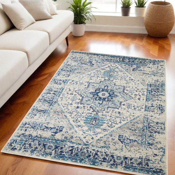 Homeroots 5' X 7' Distressed Floral Medallion Area Rug In Ivory And Light Blue – Durable, Stain-resistant Charm  Polypropylene 550895