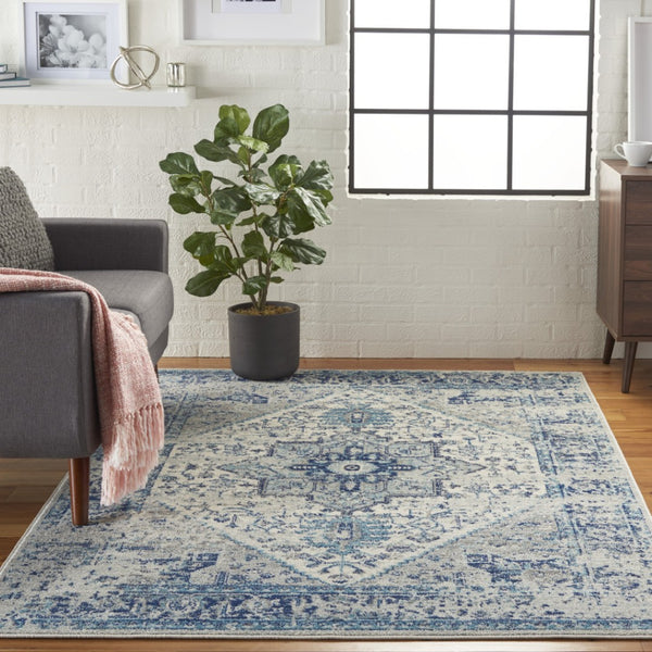 Homeroots 5' X 7' Distressed Floral Medallion Area Rug In Ivory And Light Blue – Durable, Stain-resistant Charm  Polypropylene 550895
