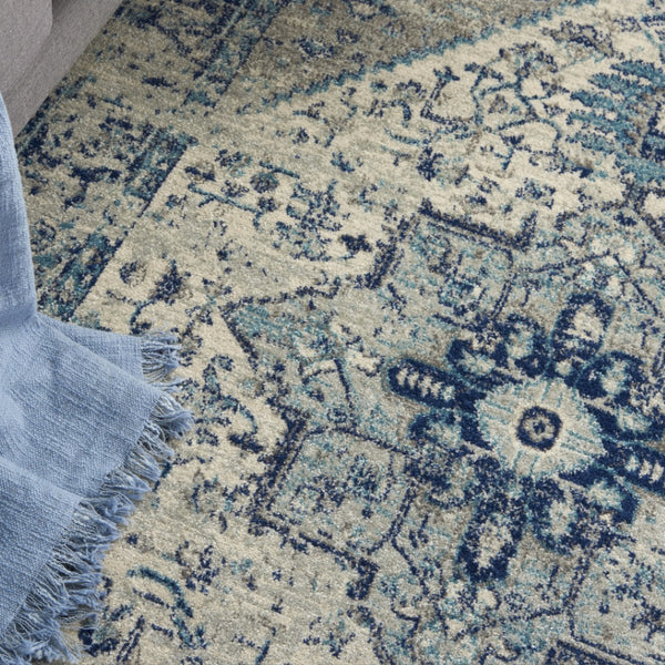 HomeRoots 5' Elegant Ivory and Light Blue Floral Medallion Distressed Area Rug for Timeless Home Style 5' X 7' 550895