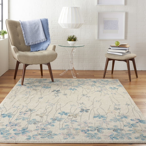 HomeRoots 5' Elegant Ivory and Blue Floral Area Rug - Durable, Stain-Resistant Design for Family Spaces 5' X 7' 550898