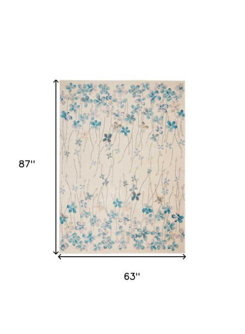 Homeroots 5' X 7' Ivory And Blue Floral Area Rug - Stain Resistant, Durable, Perfect For Kids & Pets!  Polypropylene 550898