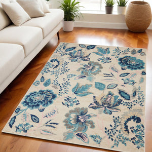 Homeroots 5' X 7' Floral Area Rug In Ivory, Navy Blue & Light Blue – Stain Resistant, Durable & Stylish Design  Polypropylene 550899