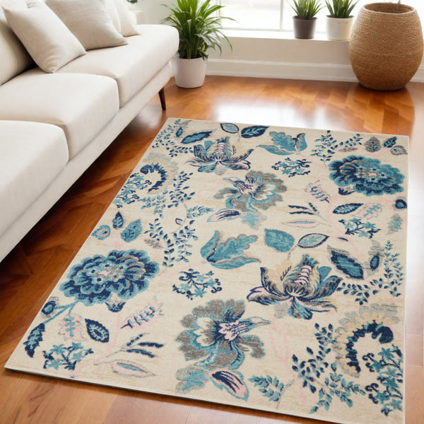 Homeroots 5' X 7' Floral Area Rug In Ivory, Navy Blue & Light Blue – Stain Resistant, Durable & Stylish Design  Polypropylene 550899