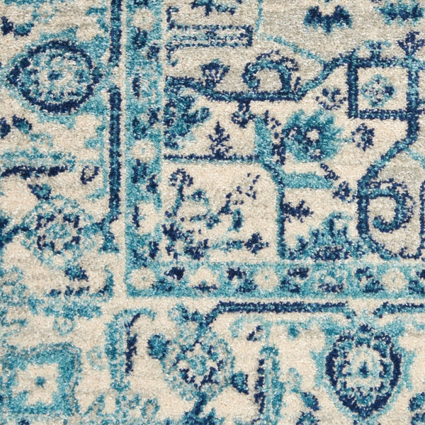 HomeRoots 6' Ivory and Navy Blue Floral Medallion Distressed Area Rug for Timeless Style in Any Room 6' X 9' 550901