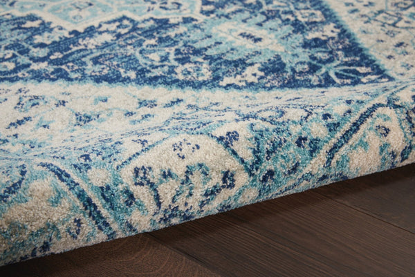HomeRoots 6' Ivory and Navy Blue Floral Medallion Distressed Area Rug for Timeless Style in Any Room 6' X 9' 550901