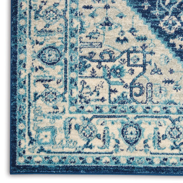 HomeRoots 6' Ivory and Navy Blue Floral Medallion Distressed Area Rug for Timeless Style in Any Room 6' X 9' 550901