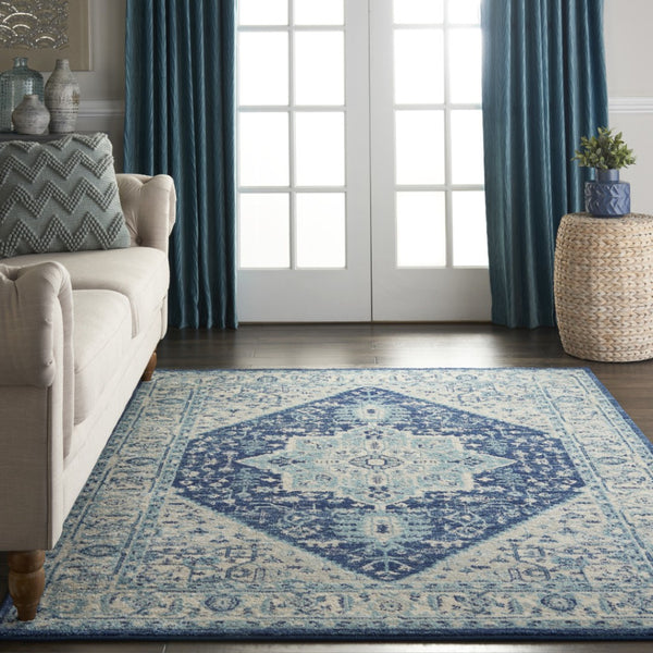 HomeRoots 6' Ivory and Navy Blue Floral Medallion Distressed Area Rug for Timeless Style in Any Room 6' X 9' 550901