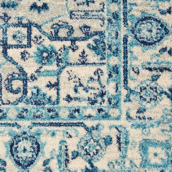 HomeRoots 6' Ivory and Navy Blue Floral Medallion Distressed Area Rug for Timeless Style in Any Room 6' X 9' 550901