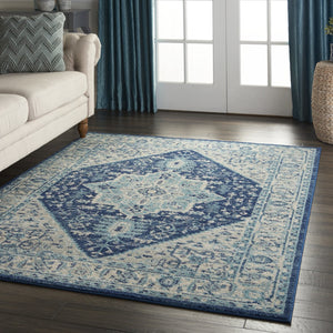 HomeRoots 6' Ivory and Navy Blue Floral Medallion Distressed Area Rug for Timeless Style in Any Room 6' X 9' 550901