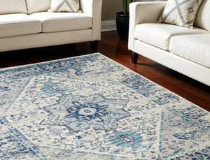 HomeRoots 5' Elegant Ivory and Light Blue Floral Medallion Distressed Area Rug for Timeless Home Style 6' X 9' 550902
