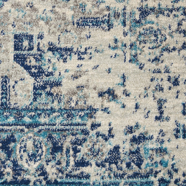 HomeRoots 5' Elegant Ivory and Light Blue Floral Medallion Distressed Area Rug for Timeless Home Style 6' X 9' 550902
