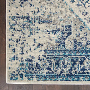 HomeRoots 5' Elegant Ivory and Light Blue Floral Medallion Distressed Area Rug for Timeless Home Style 6' X 9' 550902