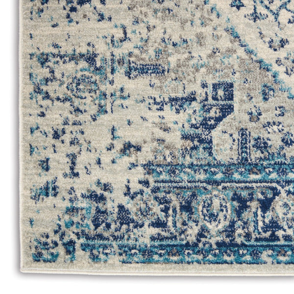 HomeRoots 5' Elegant Ivory and Light Blue Floral Medallion Distressed Area Rug for Timeless Home Style 6' X 9' 550902
