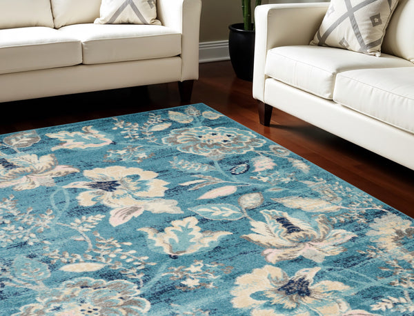 Homeroots 6' Stunning Turquoise Cream & Navy Floral Distressed Area Rug - Durable, Stain Resistant Design! 6' X 9' Polypropylene 550904