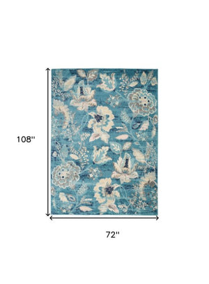 Homeroots 6' Stunning Turquoise Cream & Navy Floral Distressed Area Rug - Durable, Stain Resistant Design! 6' X 9' Polypropylene 550904