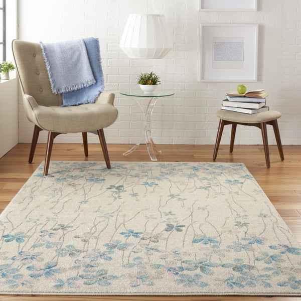 HomeRoots 5' Elegant Ivory and Blue Floral Area Rug - Durable, Stain-Resistant Design for Family Spaces 6' X 9' 550905