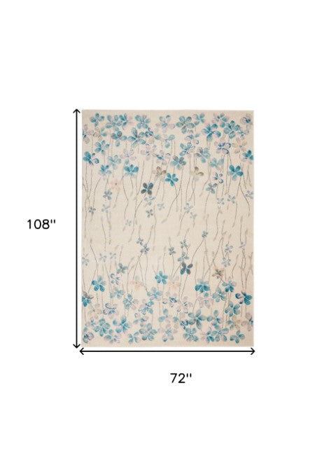 Homeroots 6' X 9' Ivory And Blue Floral Area Rug - Stain Resistant, Durable, Perfect For Kids And Pets, Stylish Home Decor  Polypropylene 550905