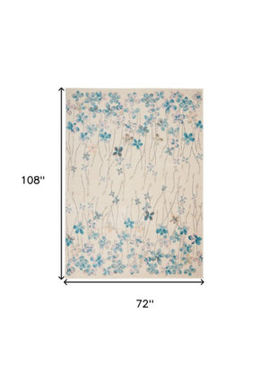 Homeroots 6' X 9' Ivory And Blue Floral Area Rug - Stain Resistant, Durable, Perfect For Kids And Pets, Stylish Home Decor  Polypropylene 550905