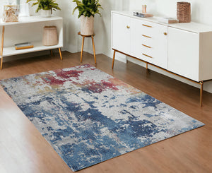 Homeroots 4' X 6' Ivory Red And Blue Abstract Distressed Non Skid Area Rug  Polypropylene,Polyester 550930